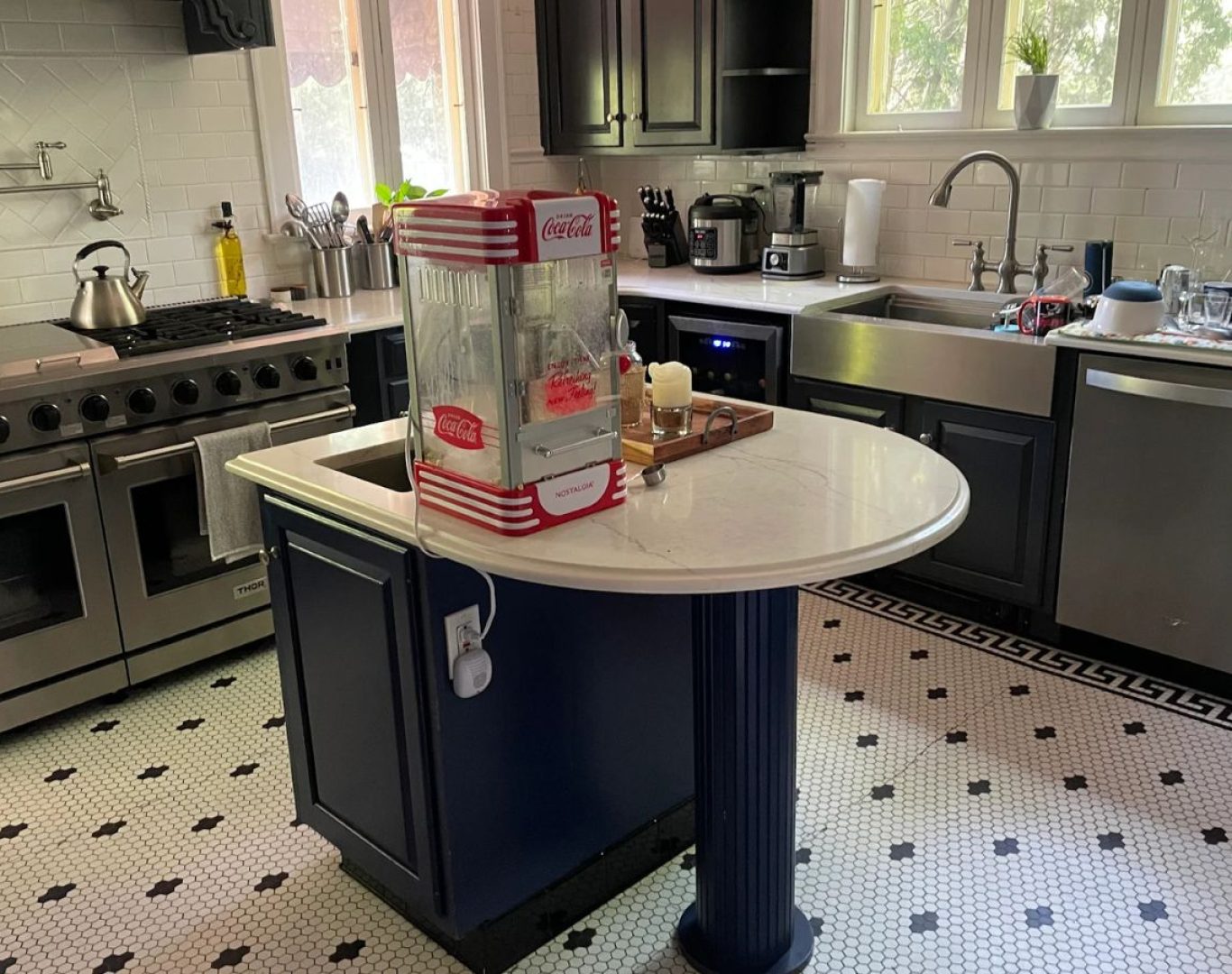 A Stay Fresh Cleaning Services team member deep-cleaning a kitchen in Kenosha County, WI, emphasizing the benefits of choosing local experts