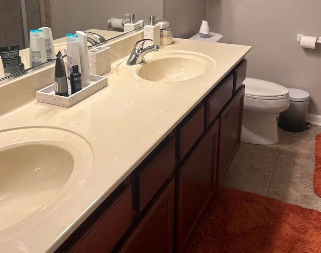 A Stay Fresh Cleaning Services team member detailing a bathroom in Lake County, IL, demonstrating our commitment to hygiene and sparkling finishes. Cleaning Service near me.