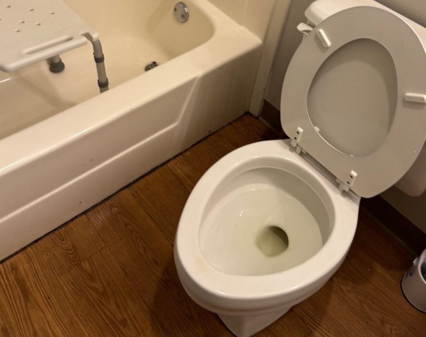 A Stay Fresh Cleaning Services cleaner working in a bathroom in Round Lake, IL, demonstrating our commitment to top-tier service and client satisfaction. Cleaning Service near me.