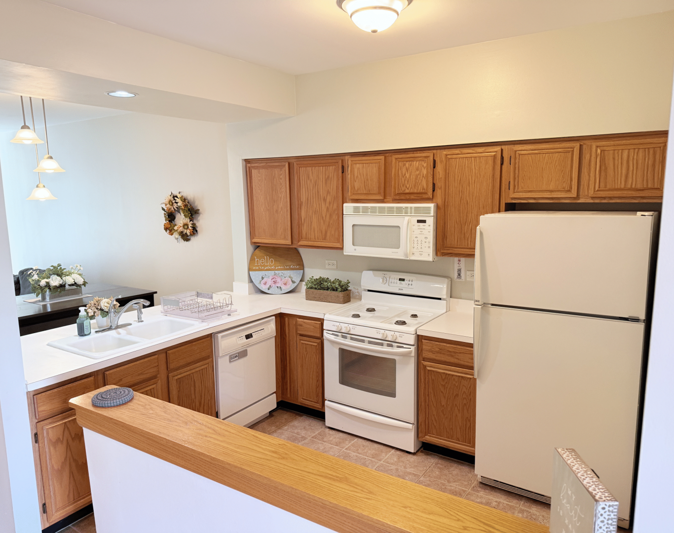 Professional cleaner performing standard cleaning in a Lake County, IL home